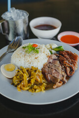 Stewed pork leg on rice at restaurant, Thai food