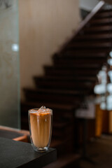 iced coffee on the table inside the cafe