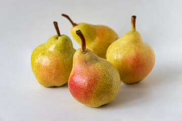 Sweet ripe yellow pears with red sides