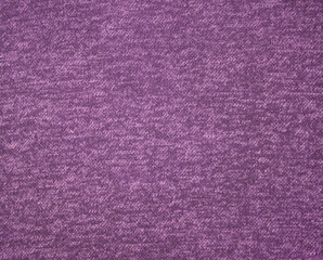 Saturated purple knitwear fabric texture, abstract background, sweater fragment