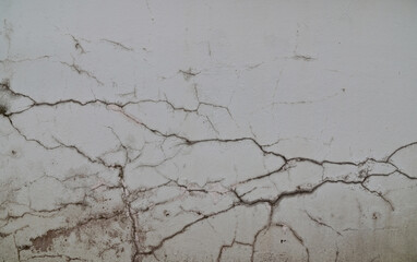 Grunge concrete cement wall with crack in industrial building, great for your design and texture background