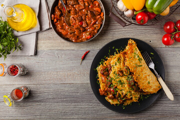 Hungarian potato pancake with goulash