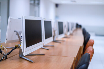 The computer lab is empty at the university.