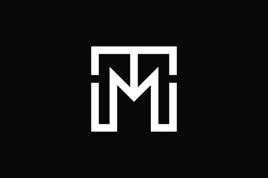 MT logo letter design on luxury background. TM logo monogram initials letter concept. MT icon logo design. TM elegant and Professional letter icon design on black background. M T TM MT