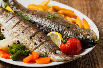 Grilled whole trout. Served with baked potatoes.
