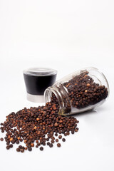 fresh Indonesian peppercorns in a grinder