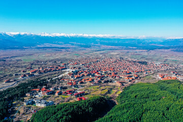 Village in a mountain landscape. Europe, Bulgaria, Bansko. Ski resort city panoramic view.
