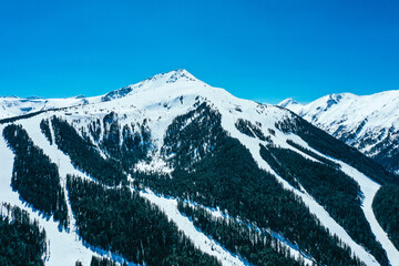 Balkans, Todorka mountain peak, ski tracks, covered with snow. Beautiful alpine natural winter...