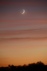 Coucher du soleil avec la lune