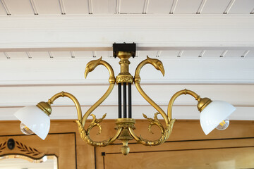 detail of the lighting of the first class lounge of the steamboat Vevey cruising Geneva lake in Switzerland
