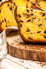 Panettone is the traditional Italian dessert for easter in 2021. Homemade panettone covered in chocolate. Sweet Bread served as dessert.