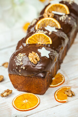 Panettone is the traditional Italian dessert for easter in 2021. Homemade panettone covered in chocolate. Sweet Bread served as dessert.