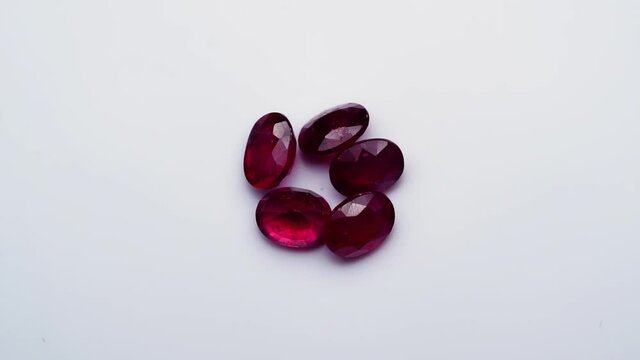 natural red rhodolite gemstone on the turning table