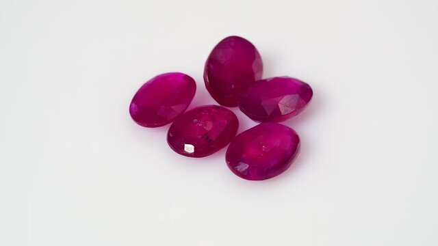 natural red rhodolite gemstone on the turning table