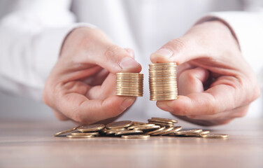 Man showing stack of coins. Business. Finance