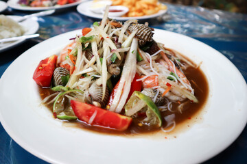 papaya salad, som tam or spicy shrimp and shell salad