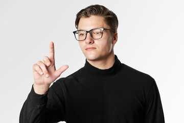 Man using an interactive transparent touch screen