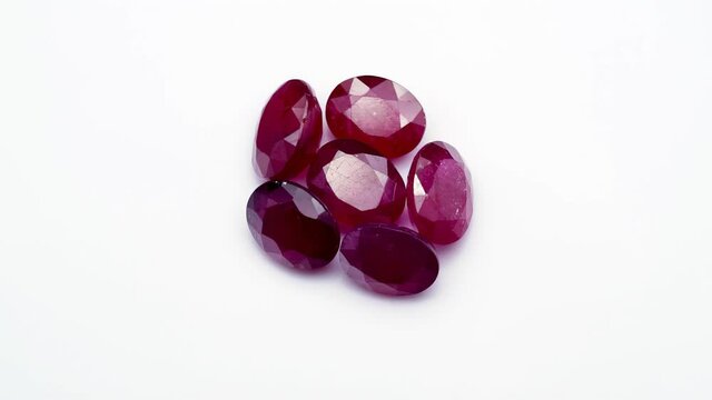 natural red rhodolite gemstone on the turning table