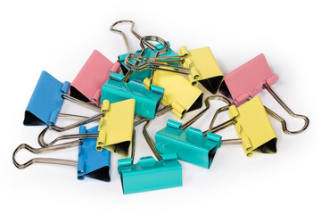 Pile of multi colored binder clips close-up