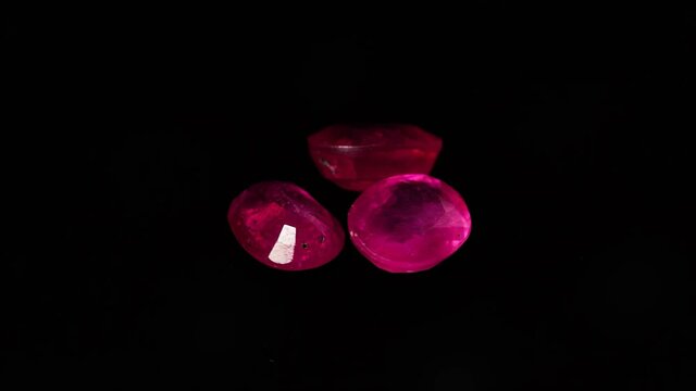 natural red rhodolite gemstone on the turning table