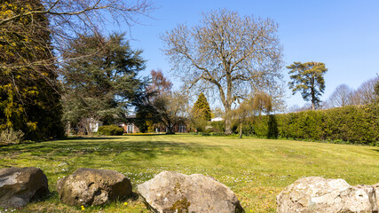 Country house garden lawn in England.