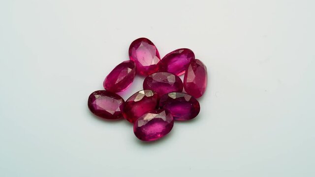 natural red rhodolite gemstone on the turning table