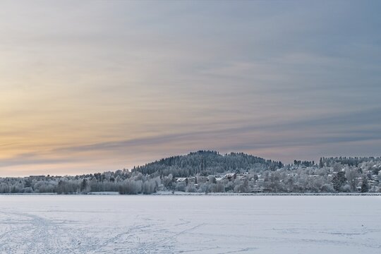 Winter view of Fr&ouml;s&ouml;n Island and the frozen Storsj&ouml;n Lake in &Ouml;stersund