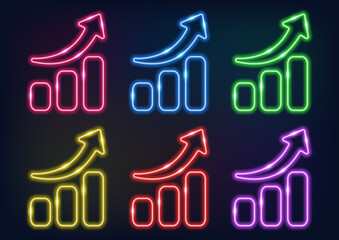 Neon sign. Arrow pointing up. Neon business graph. The growing lines on a dark background.