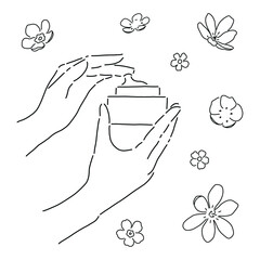 Cream applying. Beautiful woman hands with cream and flowers