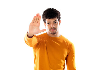 Cute african american man with afro hairstyle wearing a orange T-shirt