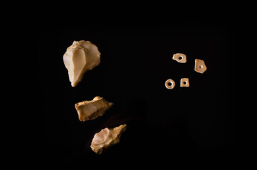 Piercers and necklace beads from the Paleolithic period, in the stone age. Necklace beads were made...