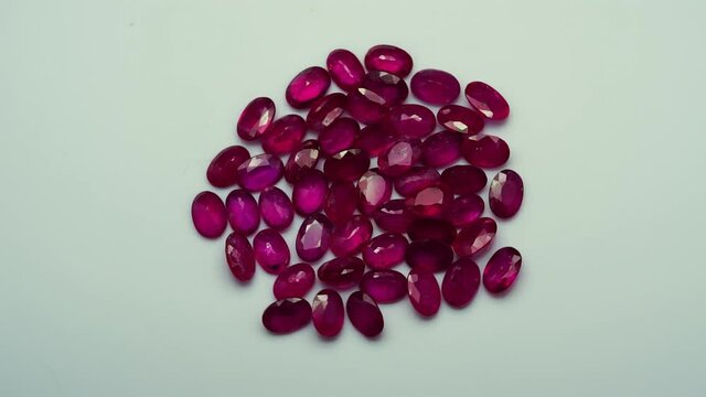 natural red rhodolite gemstone on the turning table