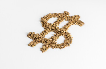 Perspective view on dollar sign made from pieces of gold on white background