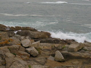waves crashing on rocks