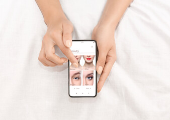 Augmented Reality Beauty App. Woman Trying Different Makeup Online