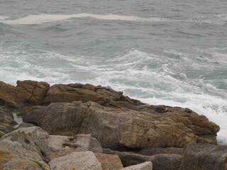 waves crashing on rocks