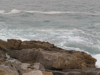 waves crashing on rocks
