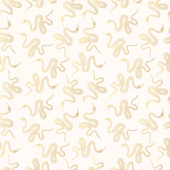 Golden celestial snake seamless pattern. Gold Mystical cobra background. Spiritual texture.
