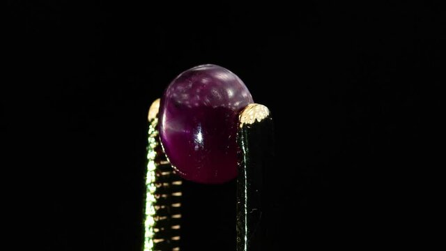 natural star ruby gemstone on the turning table