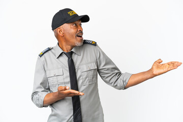 Senior staff man isolated on white background with surprise expression while looking side
