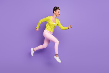 Fototapeta na wymiar Full length body size photo of woman with girlish hairstyle jumping running fast on sale isolated on pastel violet color background