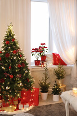 Fototapeta na wymiar Living room with Christmas decorations. Festive interior design