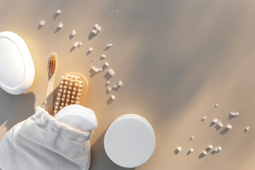 Bath accessories flat lay on beige background. Natural body care concept