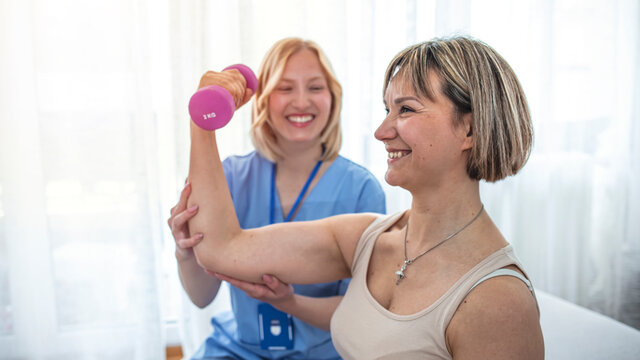 Physical Doctor consulting with patient About Shoulder muscule pain problems Physical therapy diagnosing concept. 