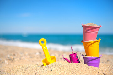 Fototapeta na wymiar Toy buckets at the beach