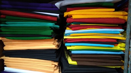 stack of colorful fabrics