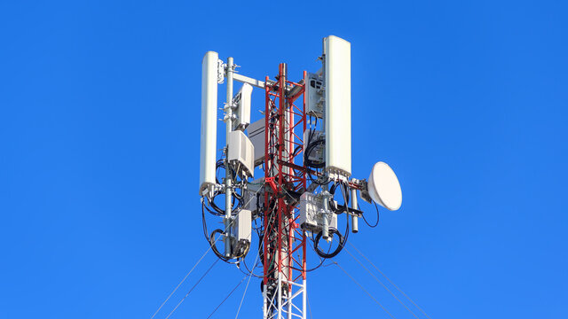 Technology on top of telecommunications GSM (5G, 4G) .The cell phone antenna on the roof of the building. Telecommunication mast antenna. Development of the system of communication