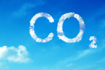 Naklejka na ściany i meble CO2 emissions. View of blue sky with white clouds