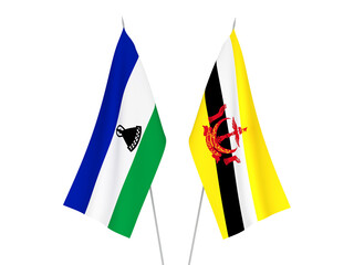 National fabric flags of Lesotho and Brunei isolated on white background. 3d rendering illustration.