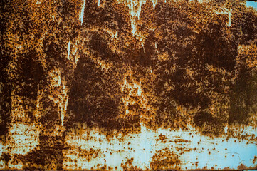 background metal surface with blue paint and rust